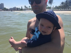 First dip in the Ocean with Dada!