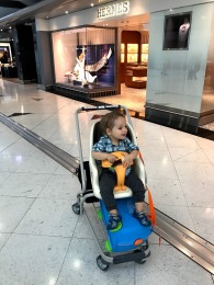 Our first stroller-less flight...thank goodness for these carts in the HK arirport